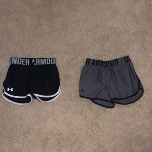two pairs of under armor shorts size girls 10-12
